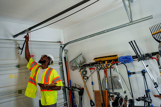 Professional Garage Door Roller Replacement technician working in Coralville, IA